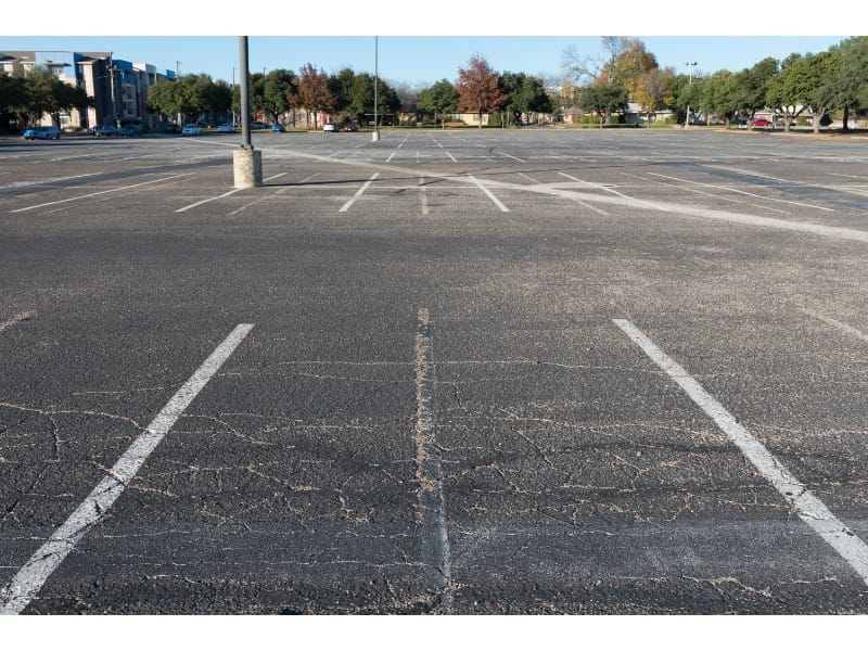 Signs Your Commercial Parking Lot Needs Repaving or Line Repainting
